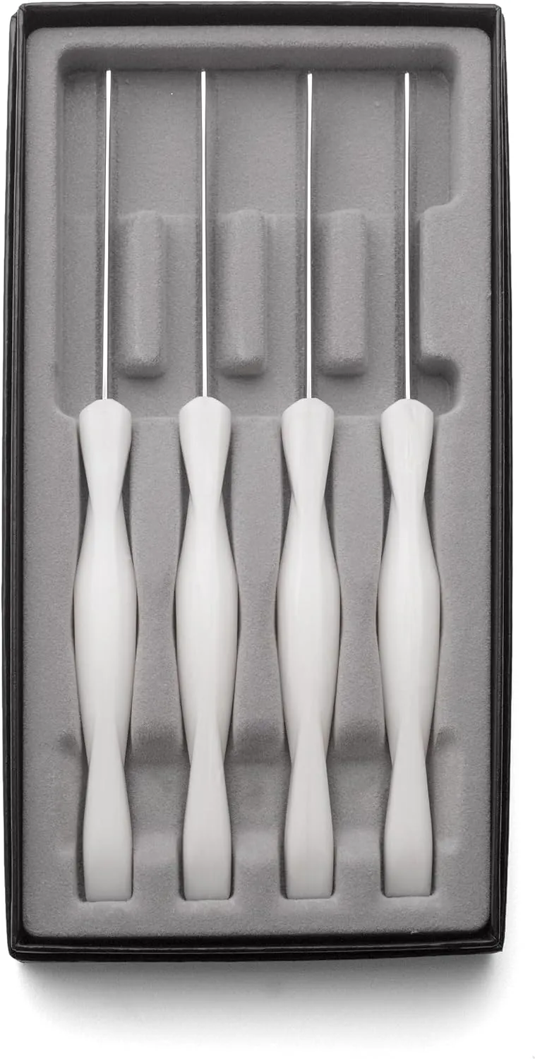 CUTCO #1865 set of 4 White (Pearl) Model 1759 Table Knives, each in a factory sealed plastic bag, inside attractive blue CUTCO box..............3.8" Double-D serrated 440A High-Carbon, Stainless