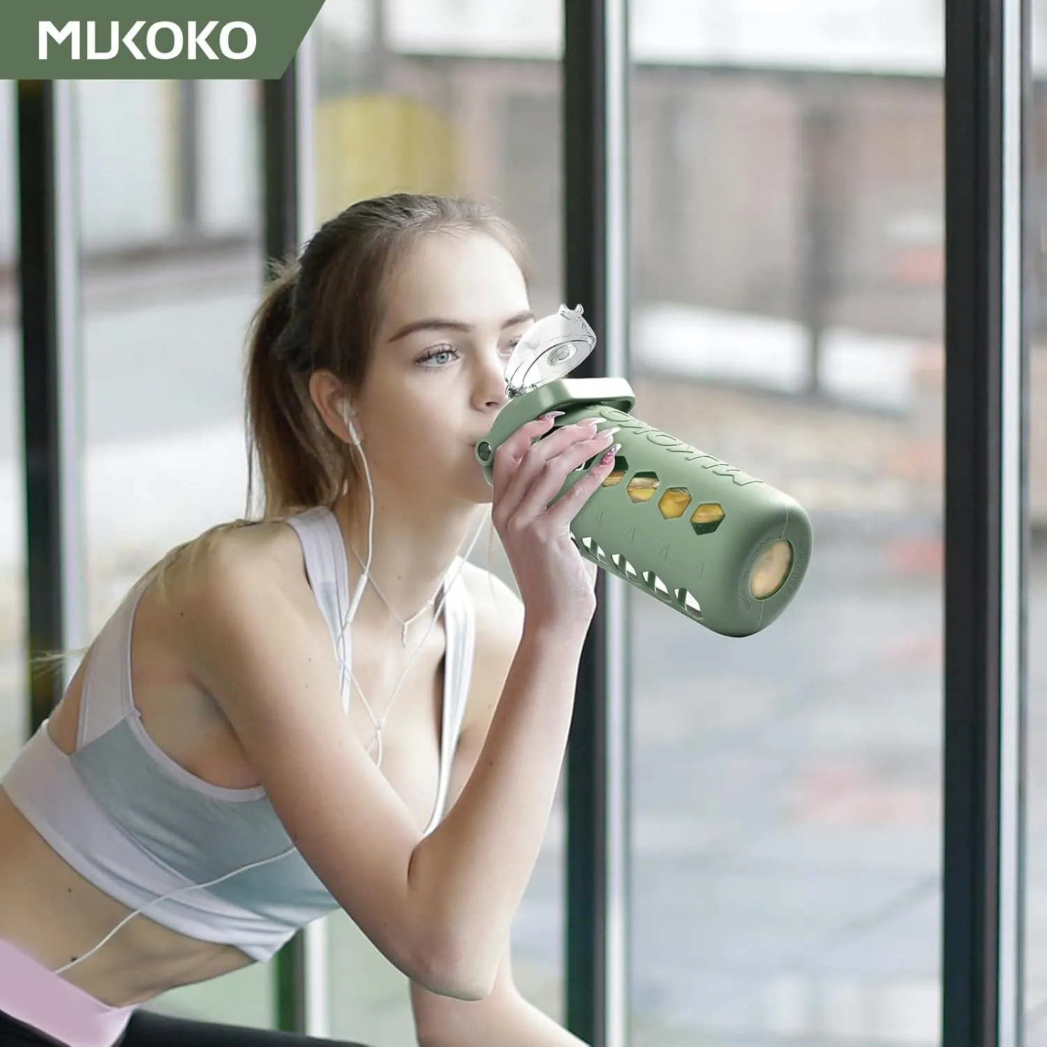 MUKOKO Glass Water Bottles 64oz with 2 Lids, Half Gallon Drinking Bottle with Straws and Measurements, 2L Sports Water Jug with Silicone Sleeve, Leakproof, Olive